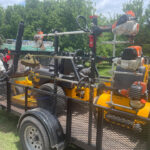 lawn care equipment in trailer bed