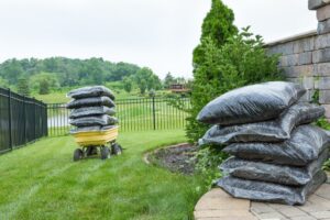bags of mulch stacked for lawn care